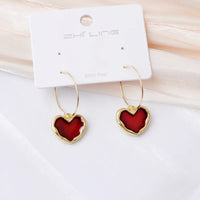 HEART-SHAPED EARRINGS